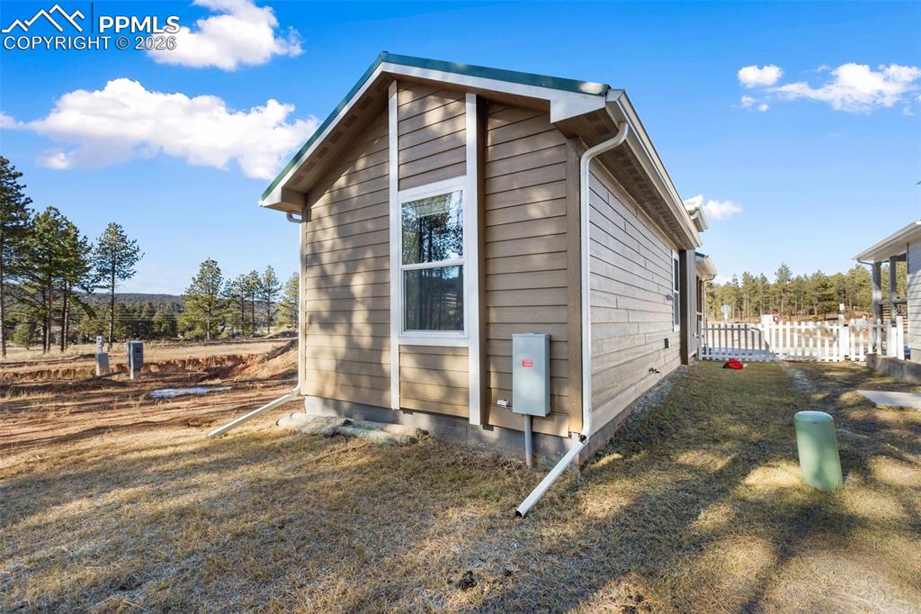 Image 14 of 15: Back of home.