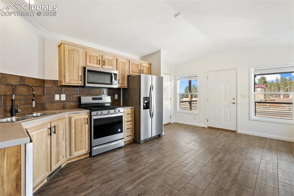 Image 5 of 15: Kitchen and Living room