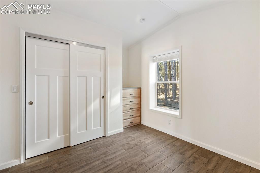 Image 9 of 15: Bedroom, closet and built in.