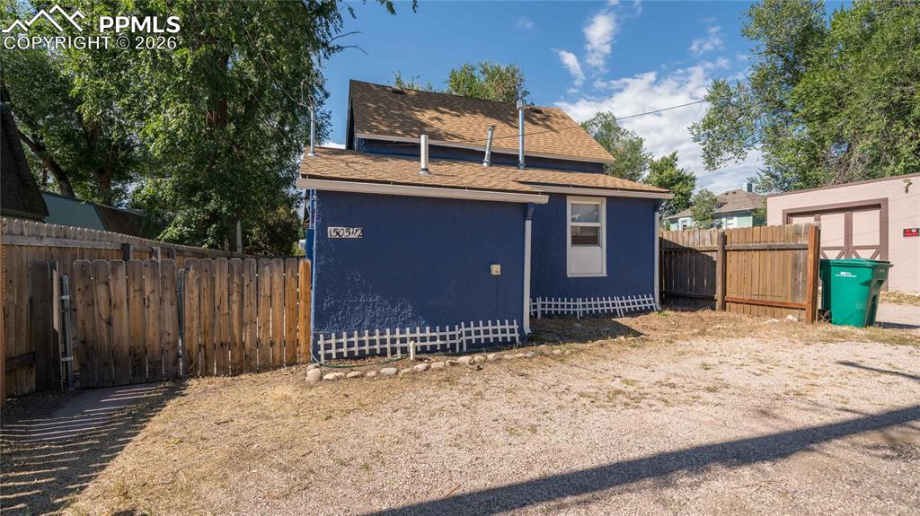 Image 14 of 14: Cottage house parking off rear alley
