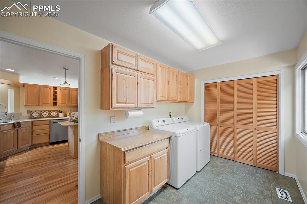 Image 19 of 49: Main level laundry