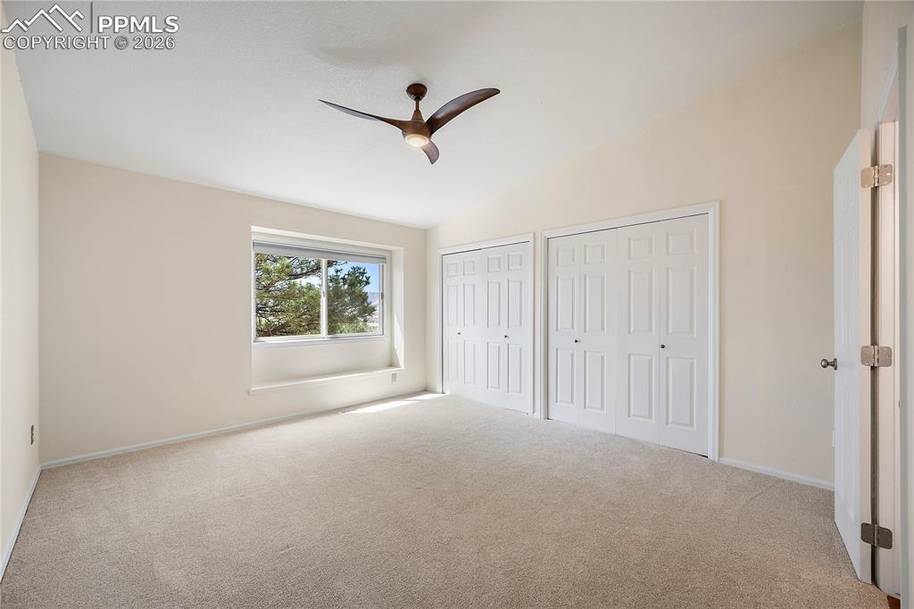 Image 22 of 49: Upstairs bedroom with double closet and attached jack n jill bath.