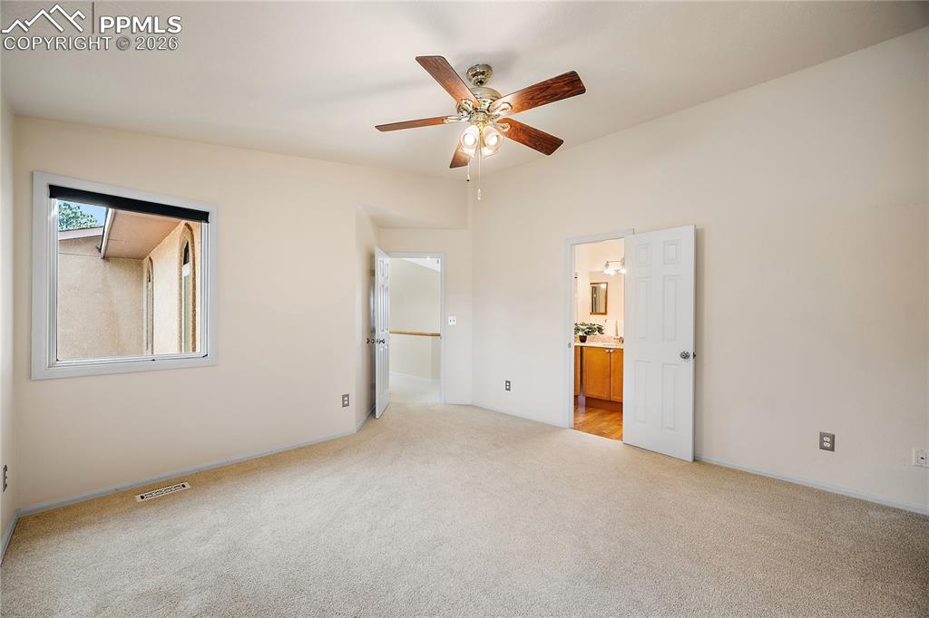 Image 25 of 49: Upstairs bedroom, attached Jack n Jill bath.