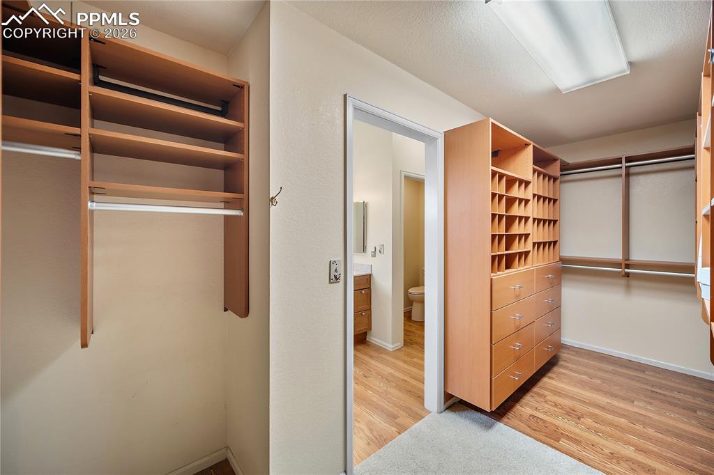 Image 30 of 49: Walk in closet