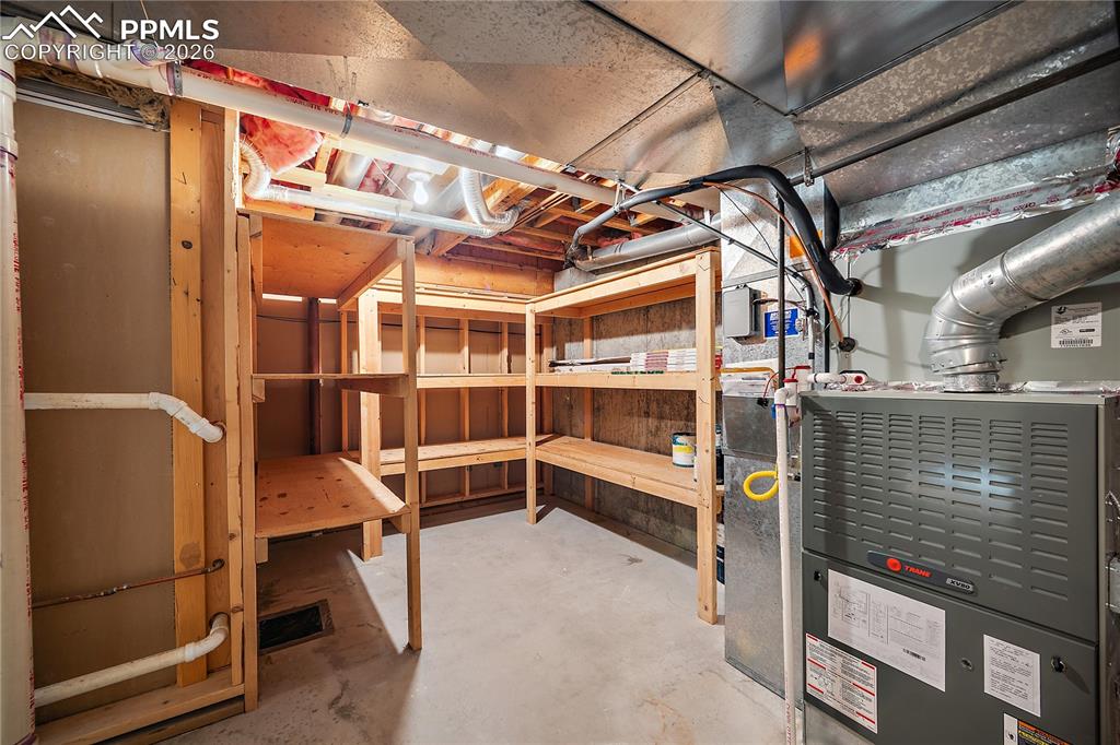 Image 38 of 49: Utility room with extra storage.