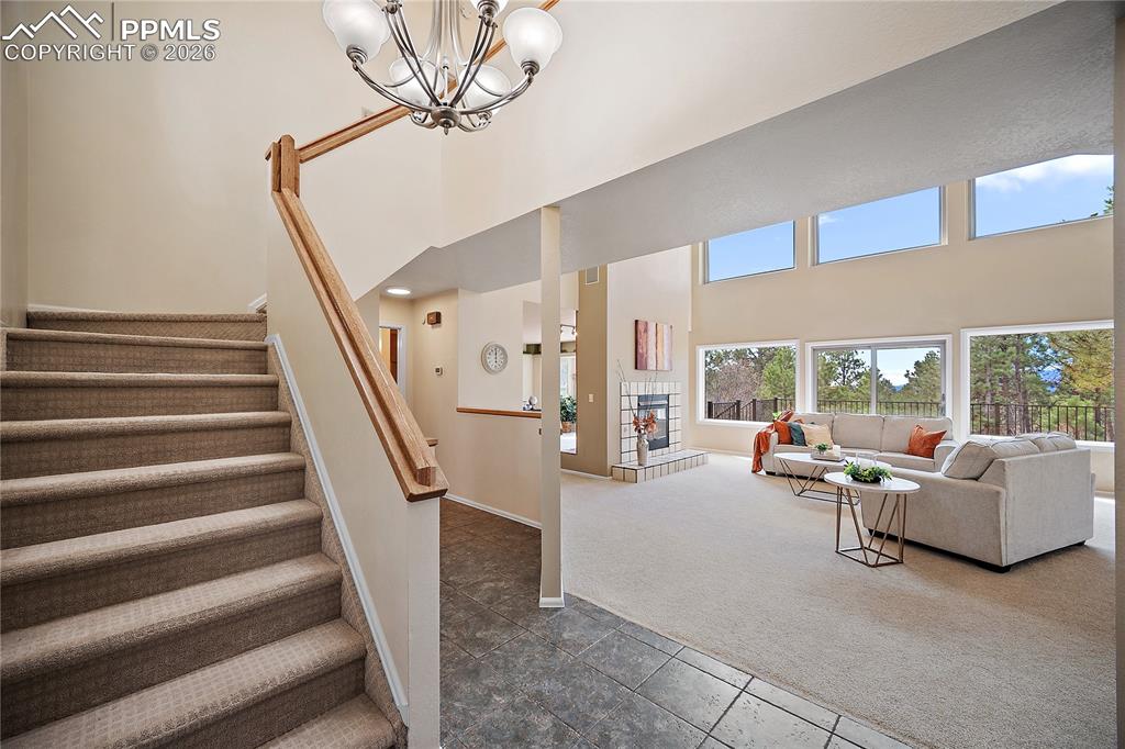 Image 7 of 49: Formal entry with tile flooring.