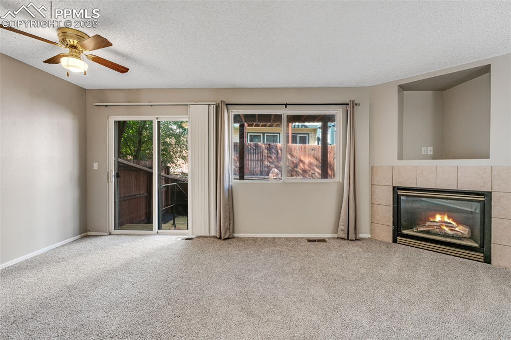 Image 5 of 30: living room featuring, carpet floors, healthy amount of natural light, and
