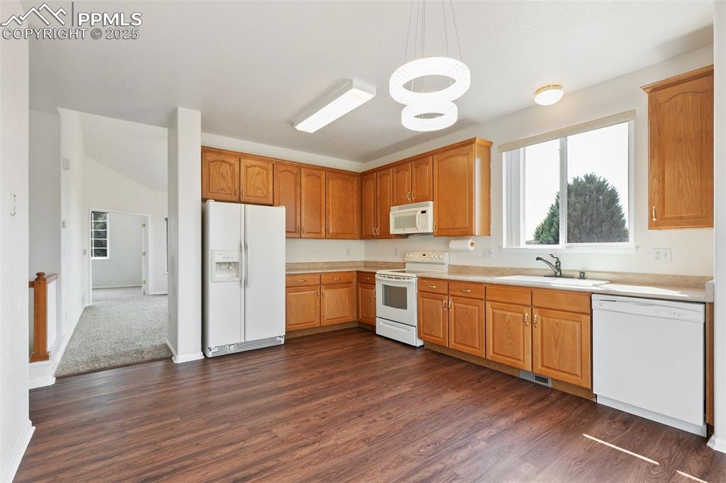 Image 10 of 28: Spacious and clean kitchen.