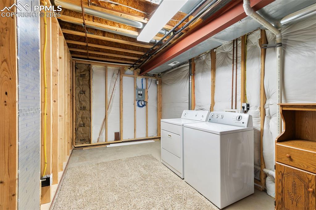 Image 25 of 28: Laundry and storage room.