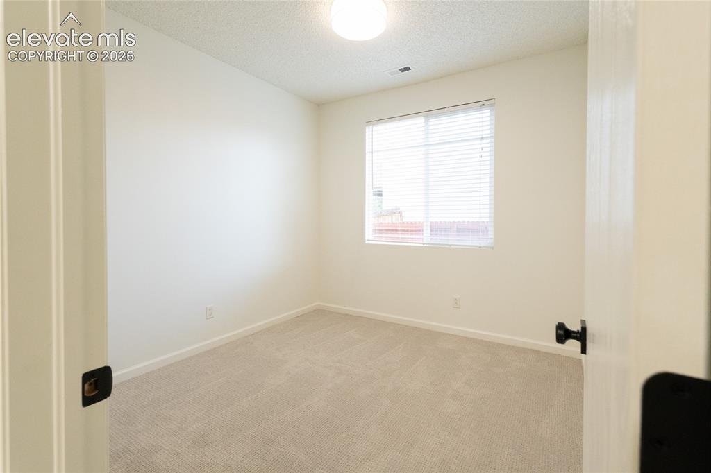 Image 19 of 26: Bedroom
