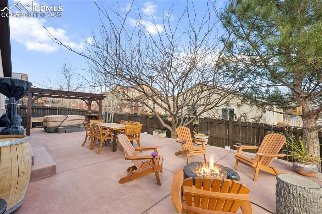 Image 12 of 45: Custom stained concrete patio