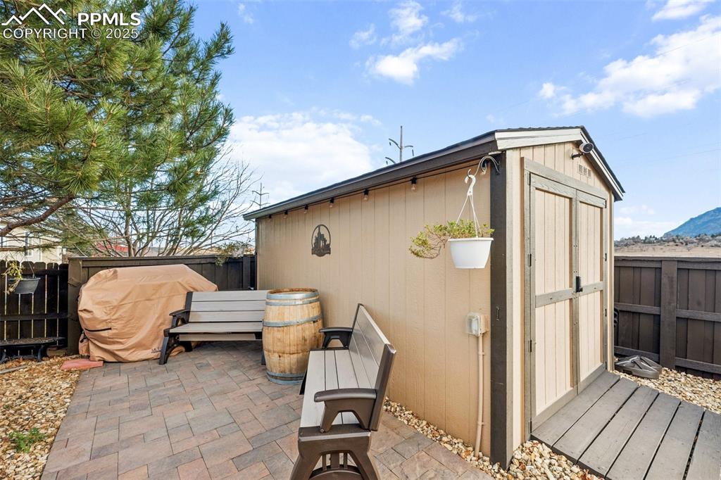 Image 16 of 45: Storage shed with electric