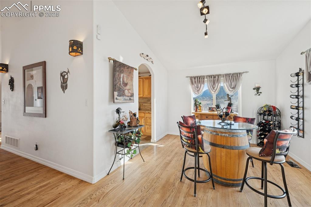 Image 19 of 45: Front sitting area, could be used as formal dining room.