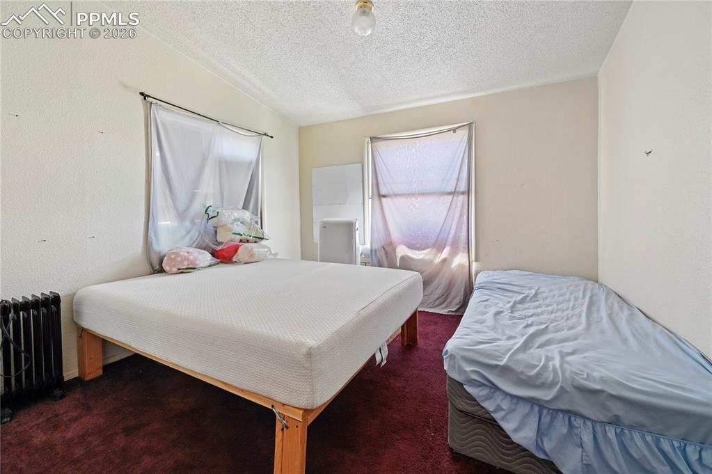 Image 11 of 33: Bedroom