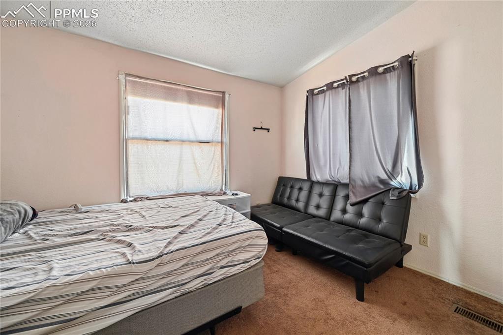 Image 15 of 33: Bedroom