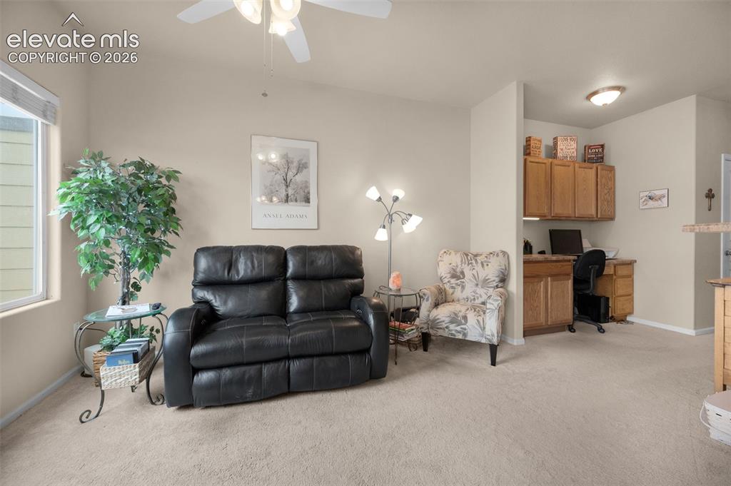 Image 10 of 28: Sitting room and office