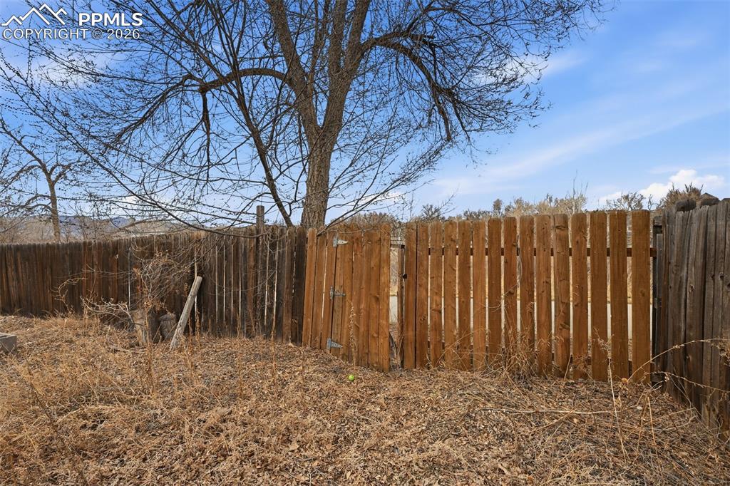 Image 30 of 35: gate to trails 