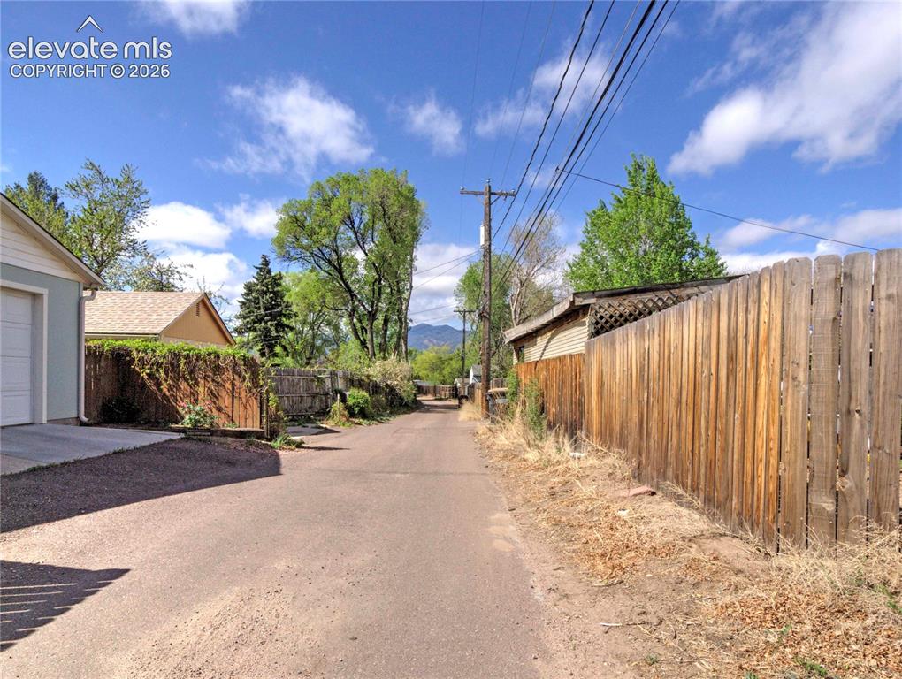 Image 18 of 25: Alley Access behind home