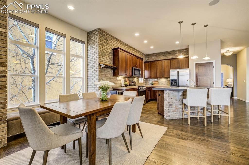 Image 15 of 50: Dining area off kitchen and living room 