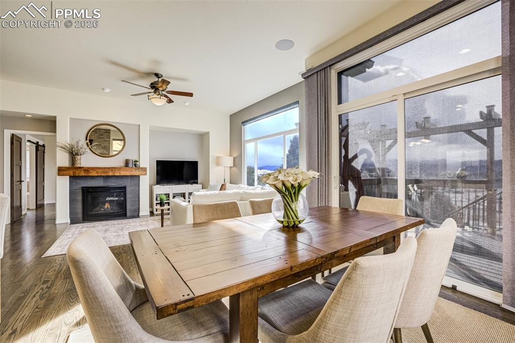 Image 16 of 50: Enjoy the light and views from the dining area 