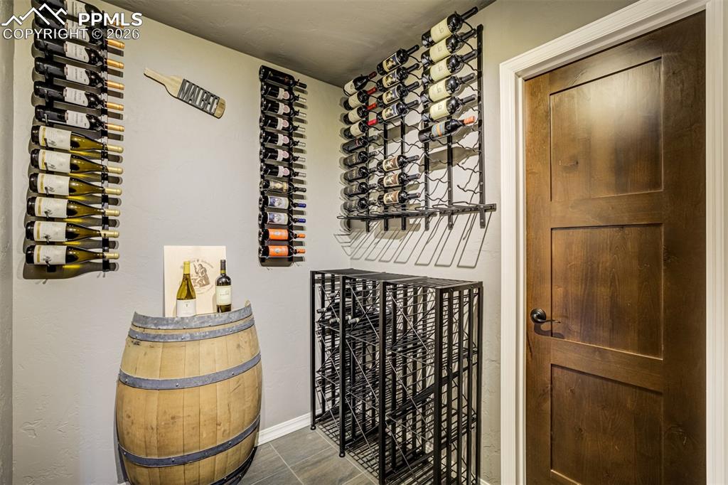 Image 33 of 50: Create your own wine cellar off the wet bar