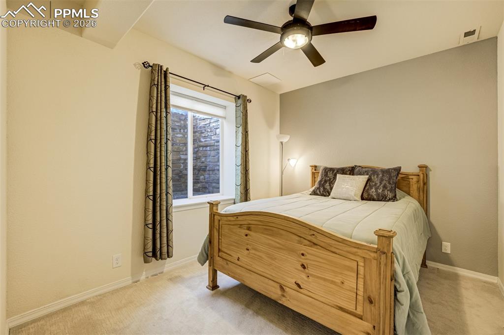 Image 34 of 50: Basement bedroom