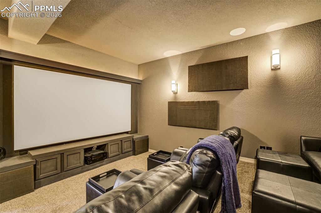 Image 39 of 50: The media room in the basement is great for movie and popcorn nights! 