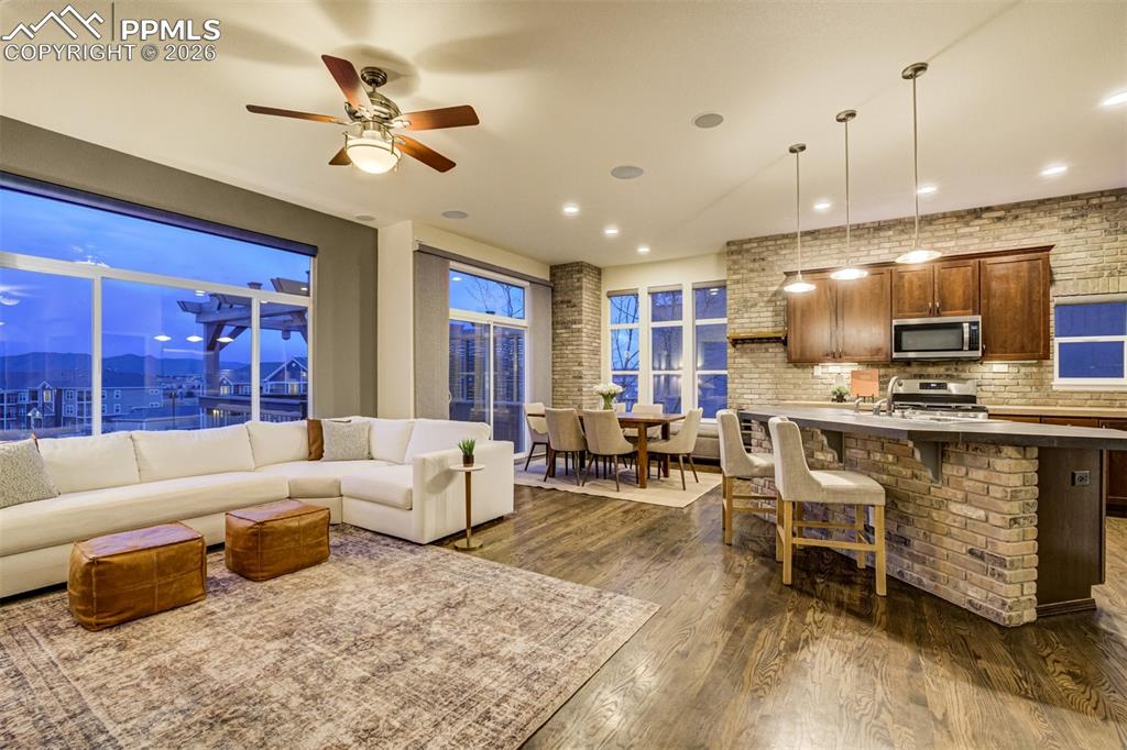 Image 7 of 50: Living and kitchen area - look at the gorgeous touches!