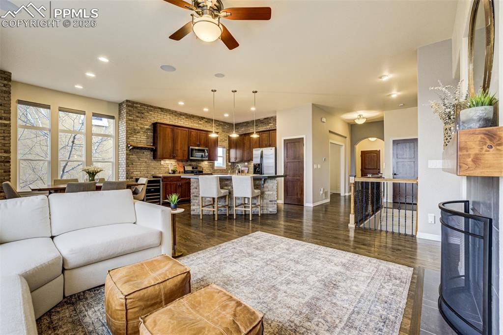 Image 8 of 50: The open design of the main level is full of natural light