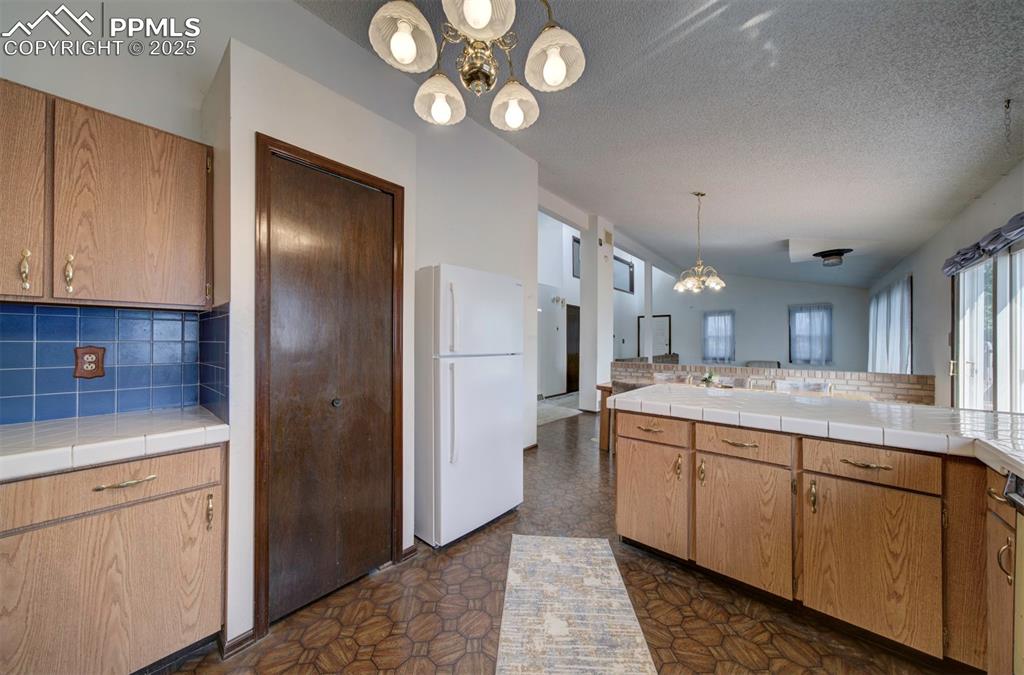 Image 17 of 50: Kitchen pantry.