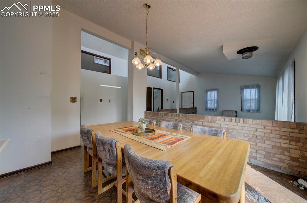 Image 20 of 50: View of the Dining Area and Living Room.