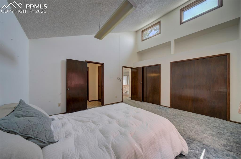 Image 22 of 50: Double closets in the main level Primary Bedroom.