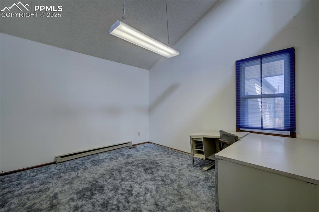 Image 29 of 50: Main level Bedroom #2 (currently an office).