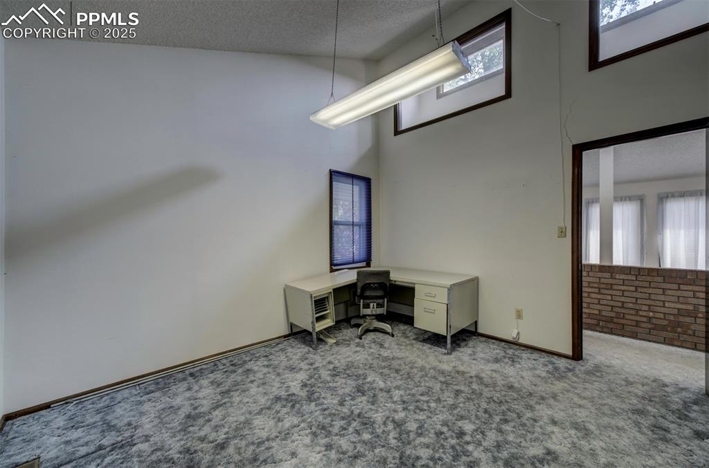 Image 30 of 50: Main level Bedroom #2 (currently an office).