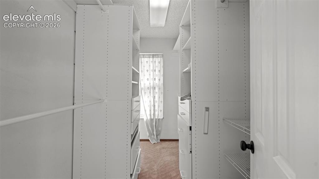 Image 26 of 34: Walk-In Closets