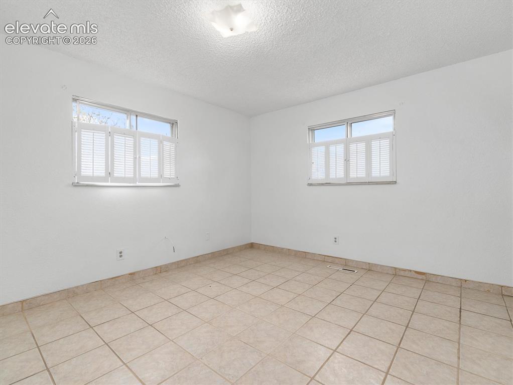 Image 16 of 39: Bedroom