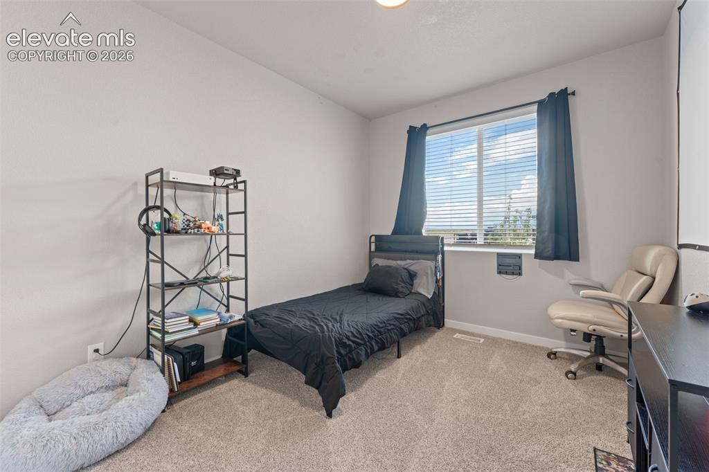 Image 12 of 30: Bedroom