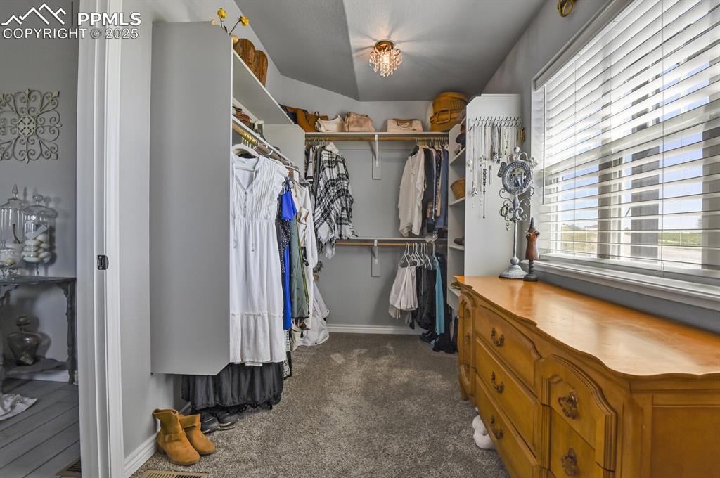 Image 20 of 50: large closet with windows