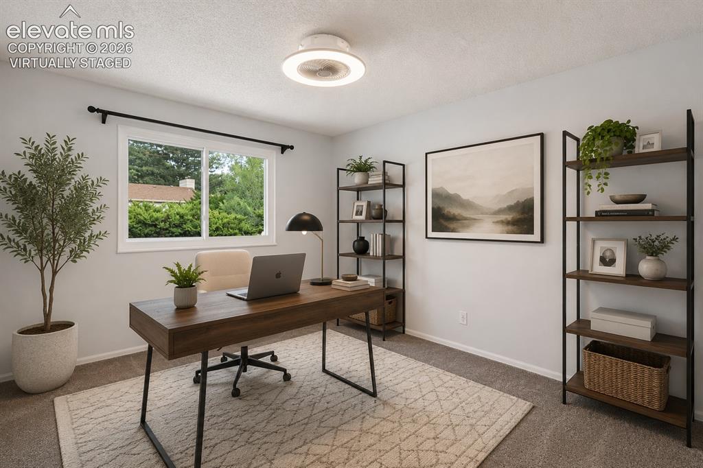 Image 14 of 32: Third Upstairs Bedroom. virtually staged