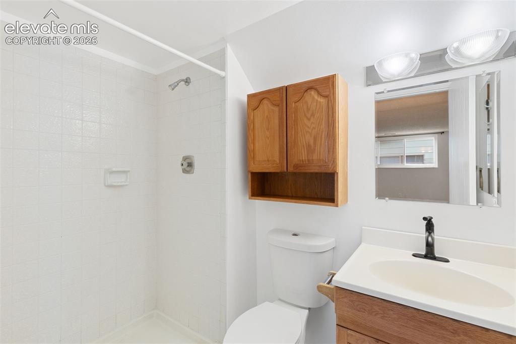Image 20 of 32: 3/4 bathroom located close to downstairs bedrooms and family-room