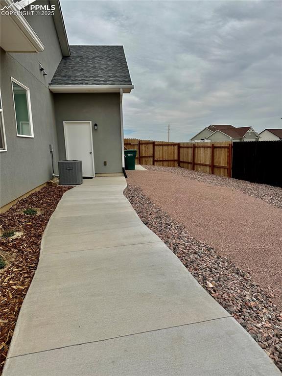 Image 33 of 38: View of fenced backyard