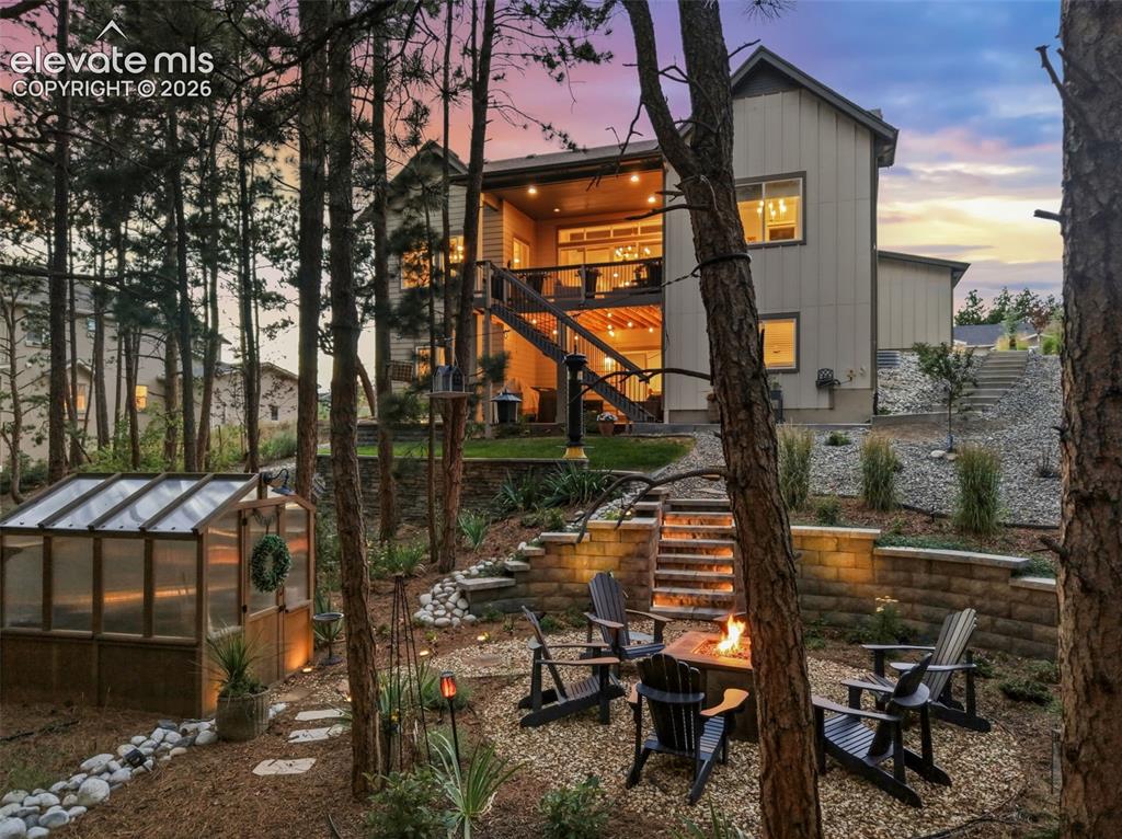 Image 2 of 48: Lower level fire pit area
