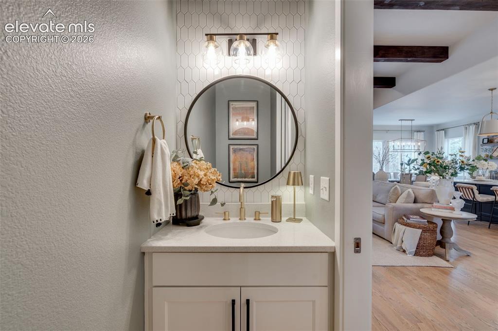 Image 23 of 48: Main-level powder bath