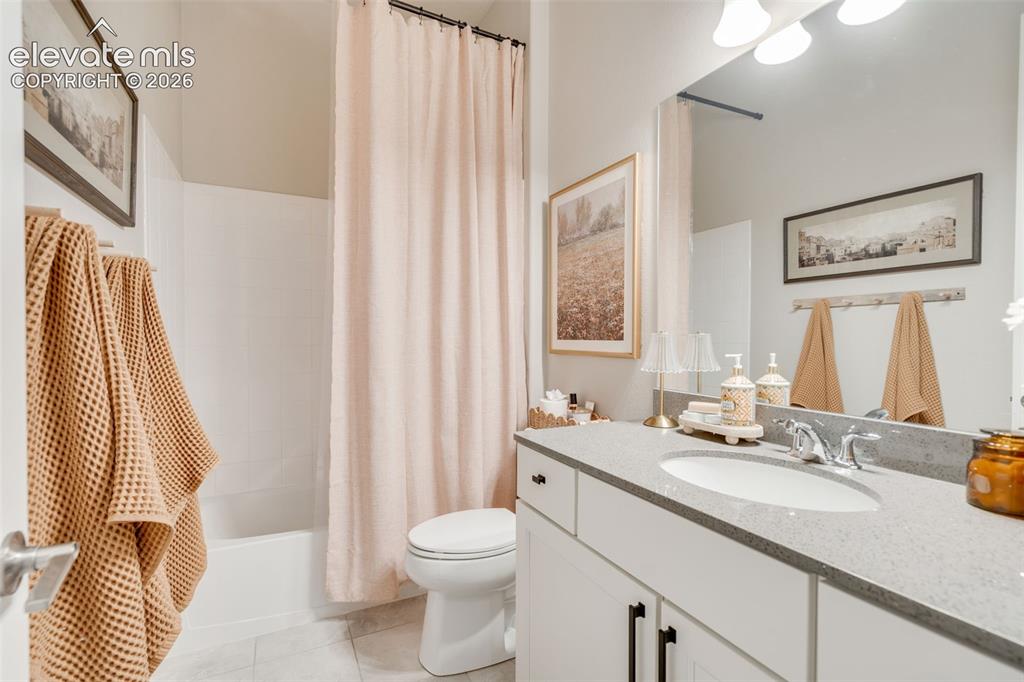 Image 28 of 48: Main-level full bath