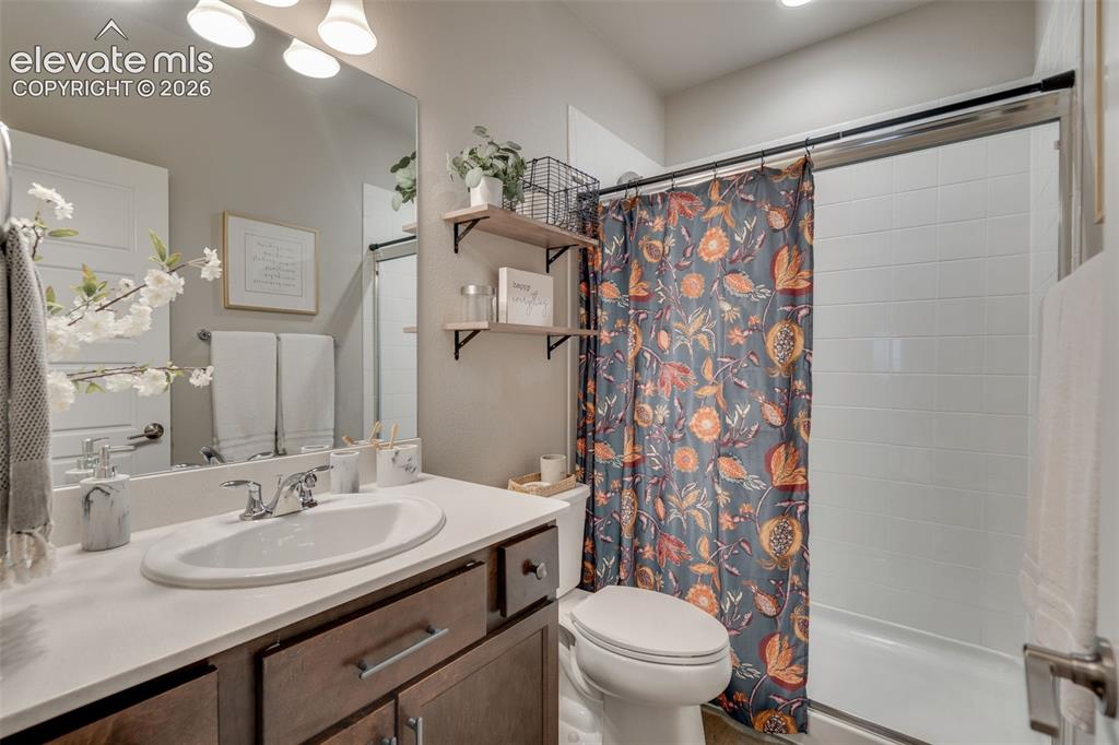 Image 39 of 48: Hall full bath
