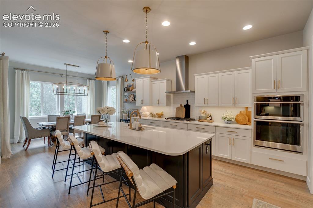 Image 4 of 48: Spacious gourmet Kitchen with a over 9-foot island