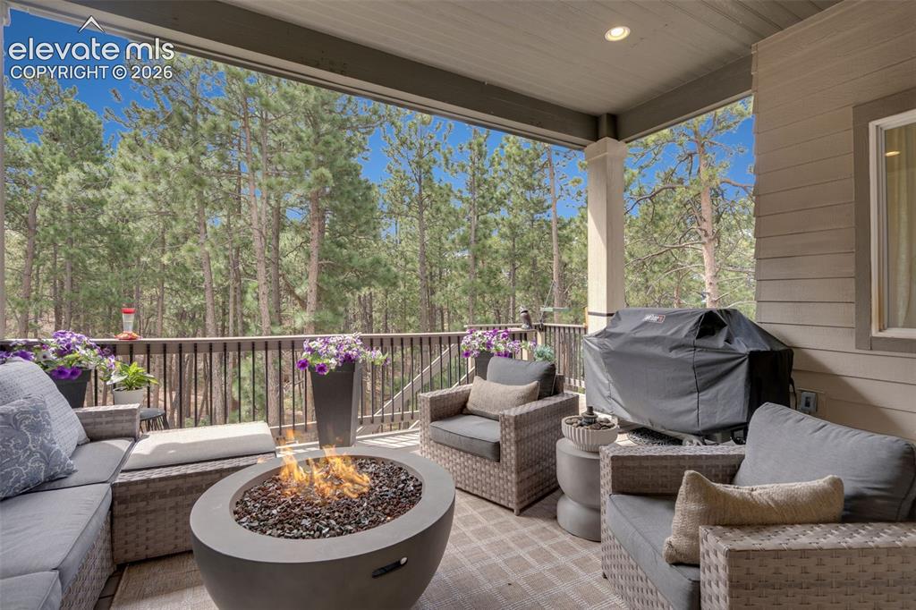 Image 6 of 48: Covered patio off of living room