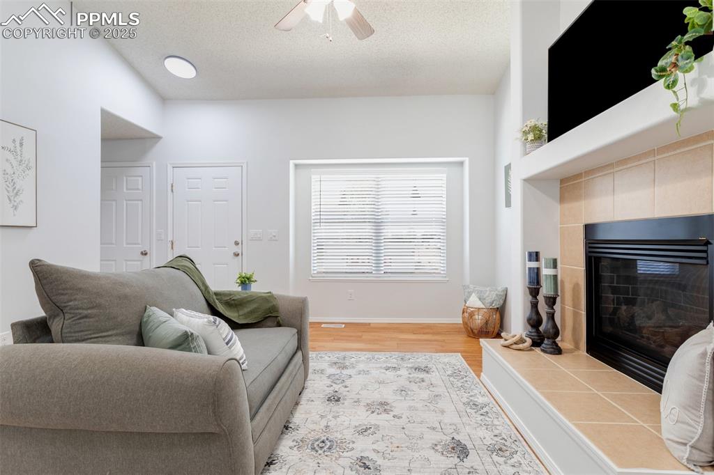 Image 10 of 41: Living Room looking at front door and garage access door
