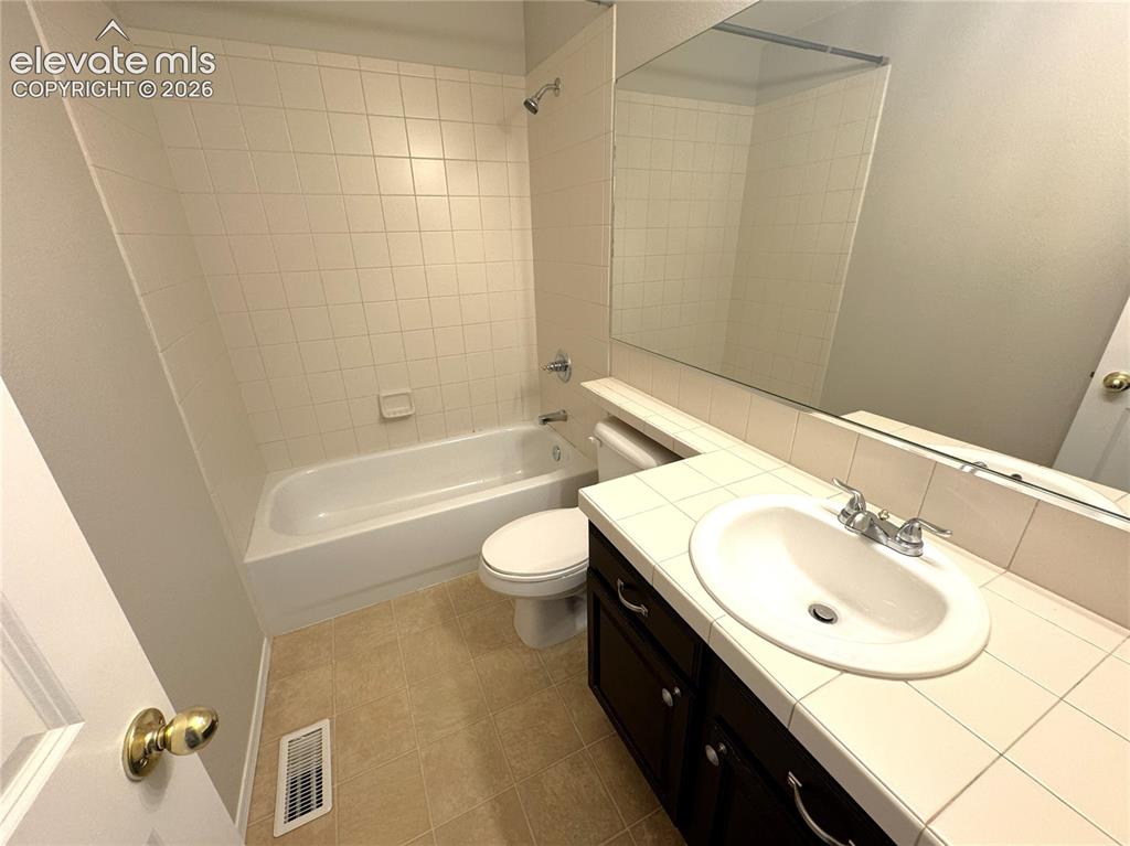 Image 23 of 43: Upper common bath