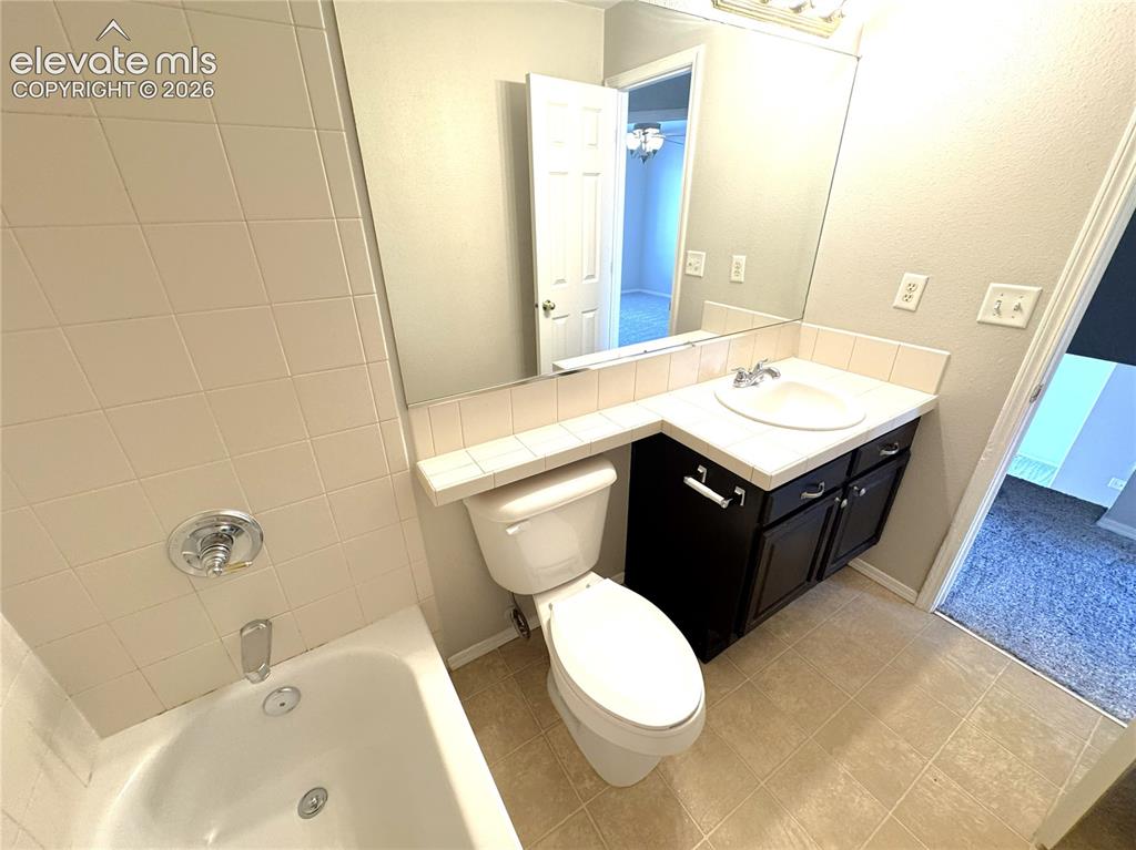 Image 24 of 43: Upper common bath